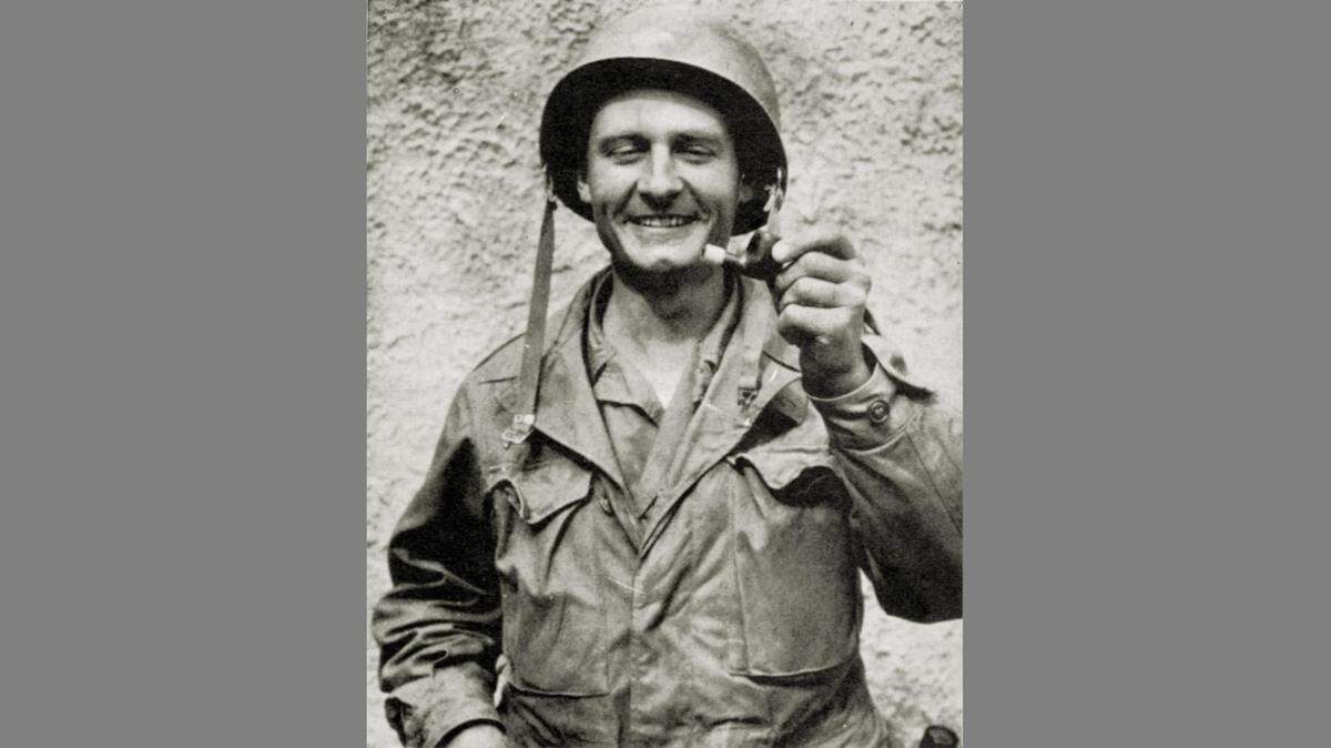 In this undated photo released by the Catholic Diocese of Wichita, Father Emil Kapaun, a Catholic priest and Army chaplain, shows his pipe which was shot out of his mouth by a sniper during the Korean conflict.