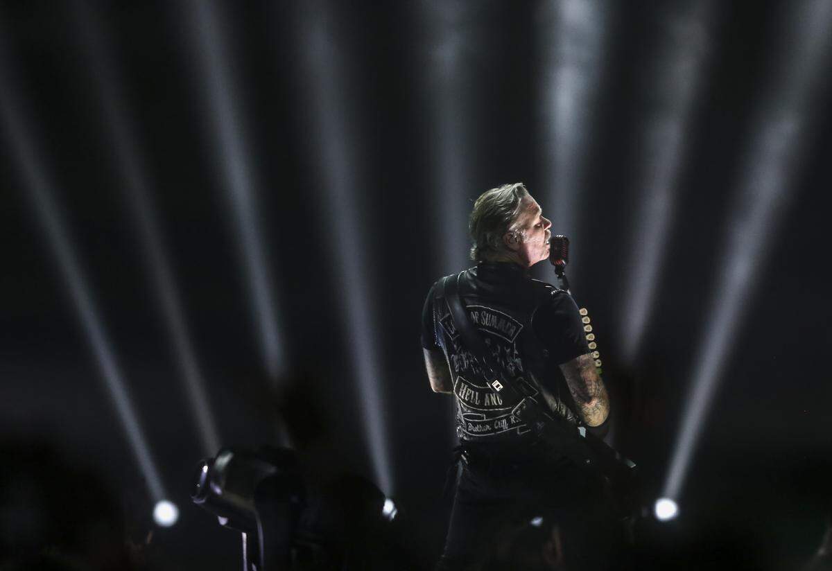 Singer James Hetfield of the band Metallica plays for a record crowd of 15,690 at Intrust Bank Arena on Monday night.