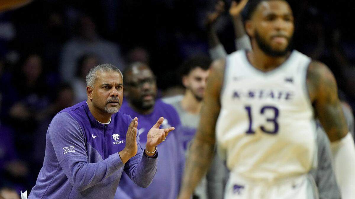 Kansas State head coach Jerome Tang watches during the first half of an NCAA college basketball game Incarnate Word Sunday, Dec. 11, 2022, in Manhattan, Kan. (AP Photo/Charlie Riedel)