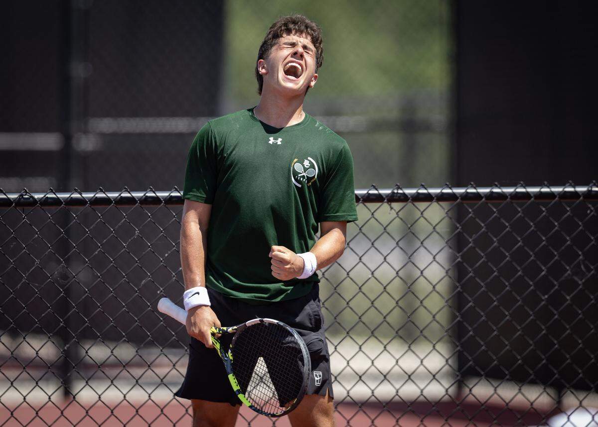 Brandon Steven reacts to on point while on his way to winning the 5A singles tennis title over Maize South’s Evan Goates on Saturday at the Andover tennis complex.