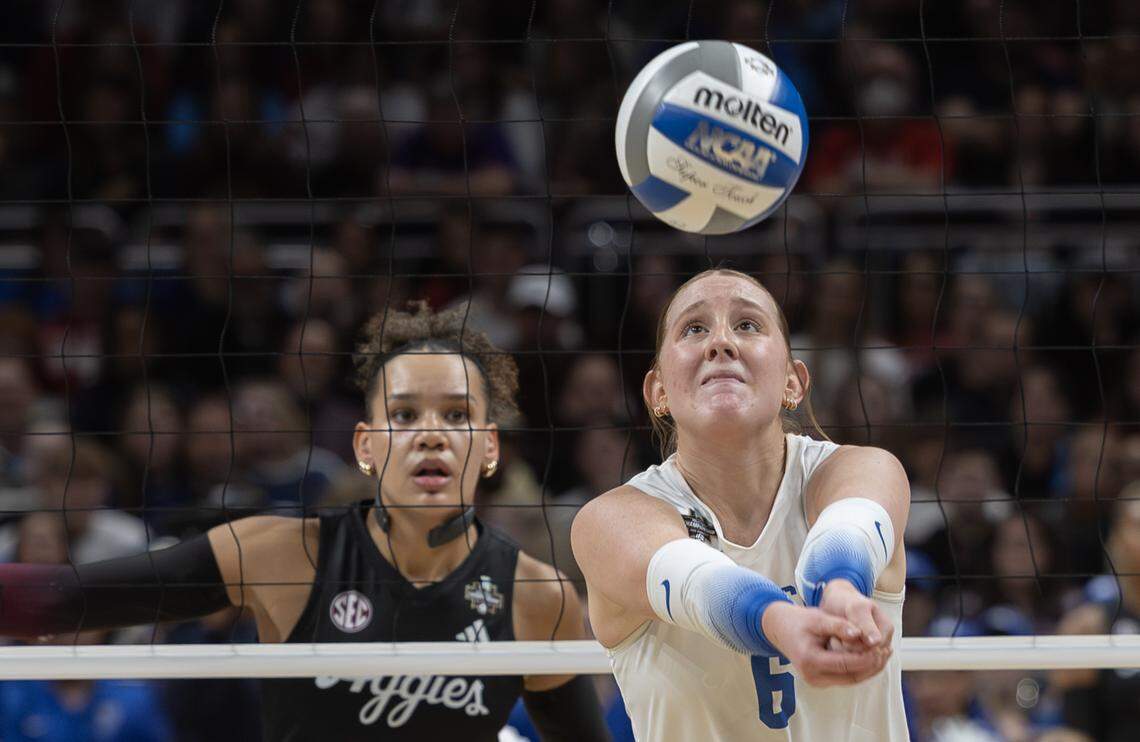 Kentucky setter Kassie O’Brien, the AVCA Freshman of the Year, hits a ball during the Wildcats’ loss Sunday to Texas A&M in the NCAA Tournament title game. 
