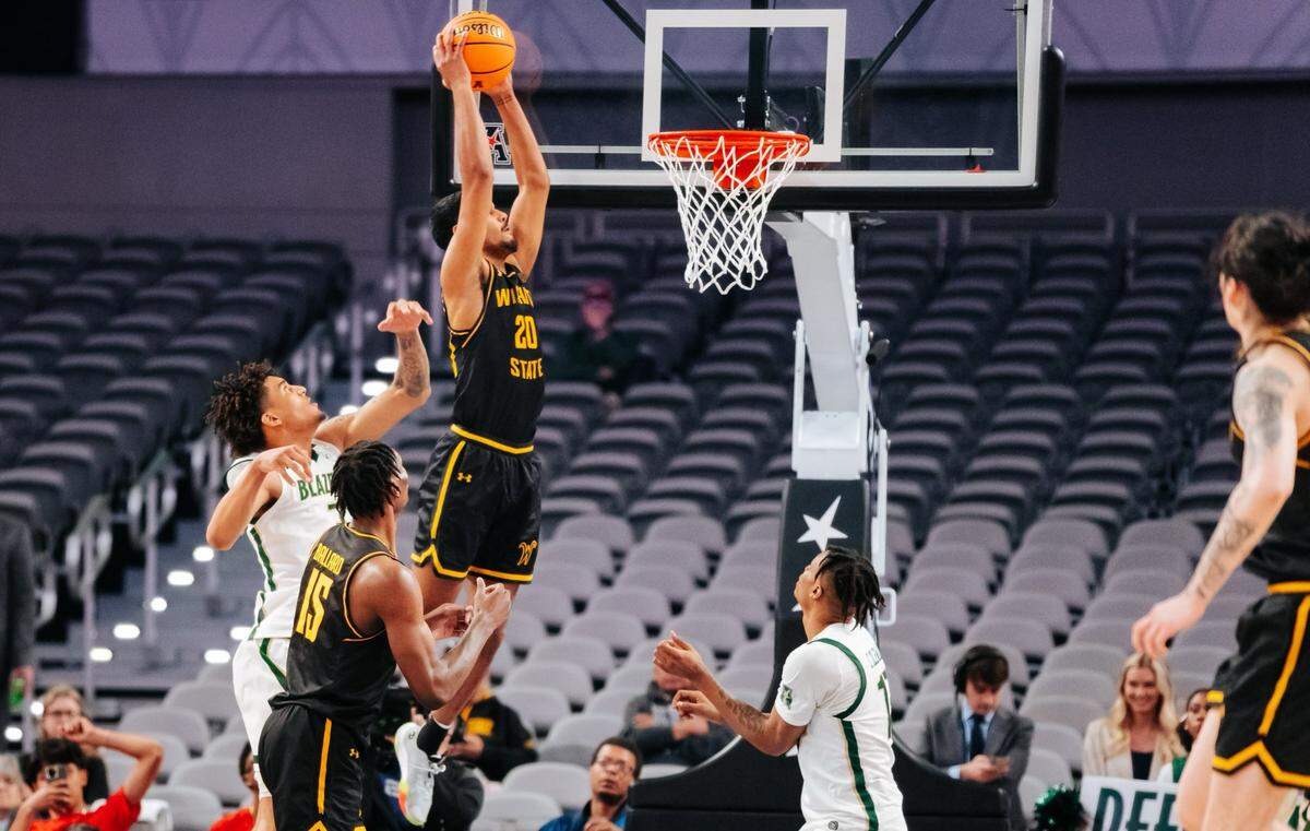 Harlond Beverly throws down an alley-oop dunk in the first half of Wichita State’s quarterfinal game against UAB on Friday afternoon at Dickies Arena in Fort Worth, Texas.