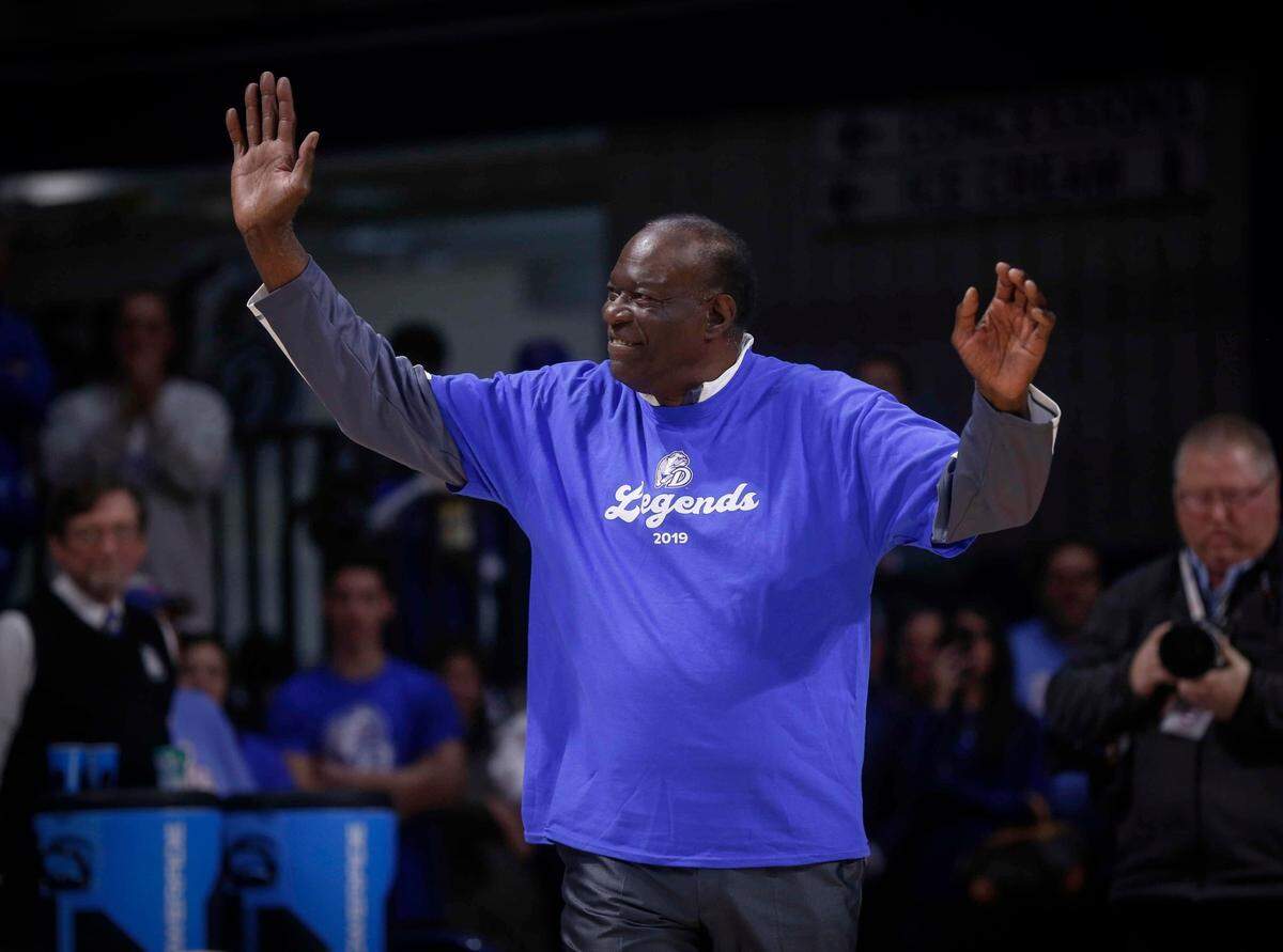 Fans cheer as Drake final four alumni Dolph Pulliam is introduced at Drake University in Des Moines in on Saturday, Feb. 9, 2019.