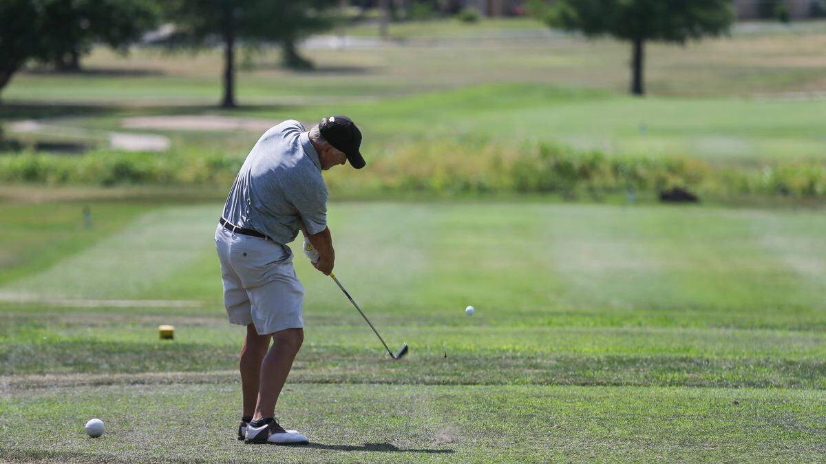 A golfer hits a tee shot at L.W. Clapp Golf Course in south Wichita. The city of Wichita is moving toward closing the municipal course.