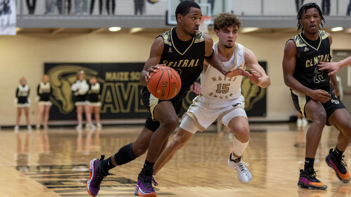 Andover Central’s Kobe Smith drives in a game earlier this season against Maize South. Both teams are in league title races this month.