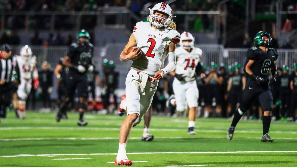 Maize quarterback Avery Johnson rushes in a touchdown for the Eagles in their 52-51 win at Derby on Friday. The K-State commit finished with seven scores in the come-from-behind victory.