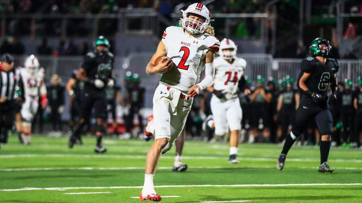 Maize quarterback Avery Johnson rushes in a touchdown for the Eagles in their 52-51 win at Derby on Friday. The K-State commit finished with seven scores in the come-from-behind victory.