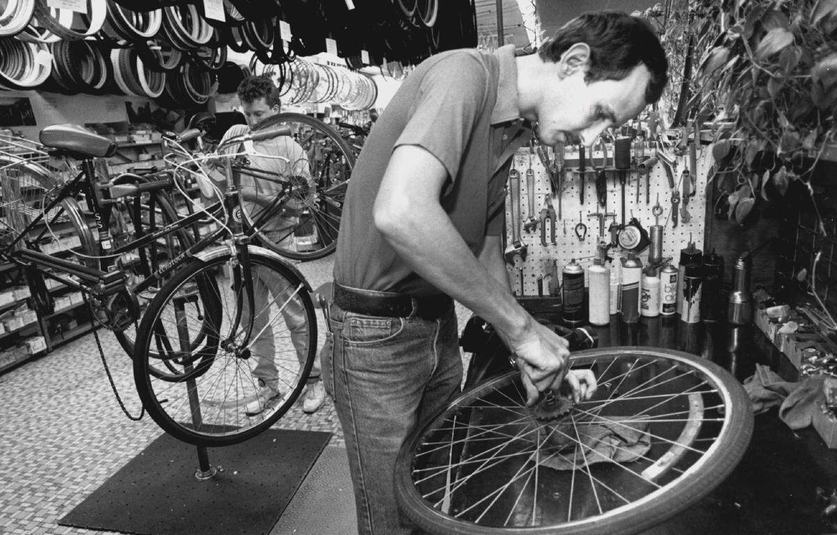Alan Keimig overhauls a three-speed bicycle hub at Tom Sawyers bicycle shop in 1991. The 60-year-old Tom Sawyer Bicycle Shop in south Wichita will close its door soon.