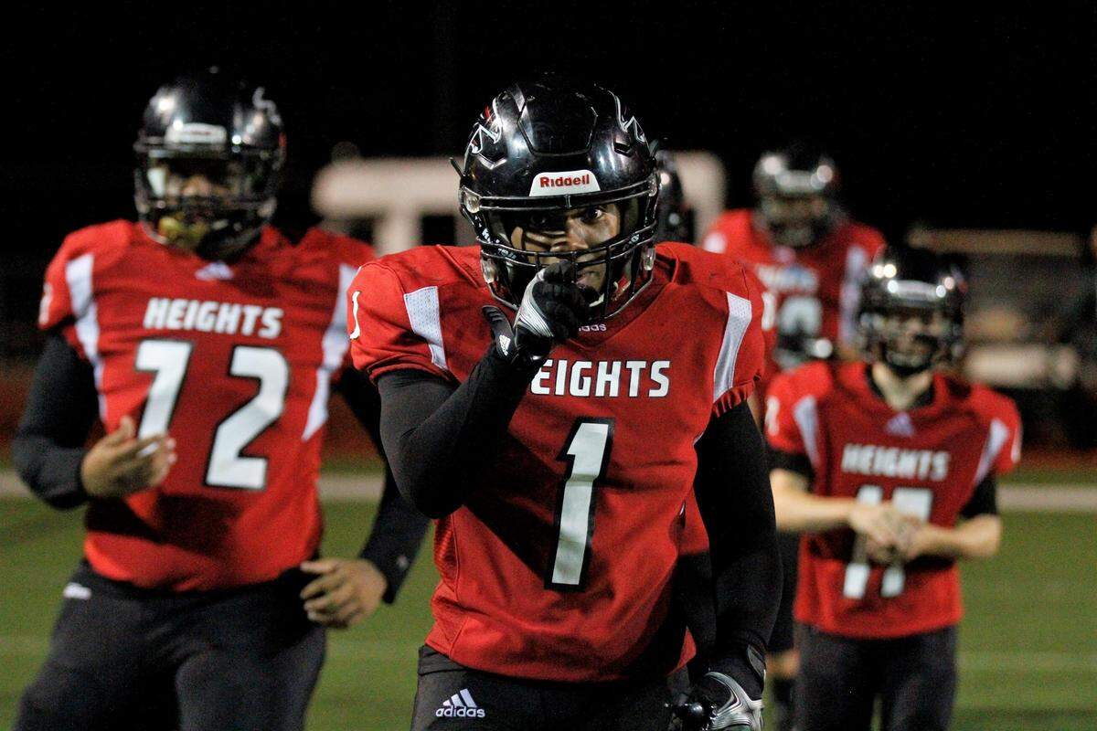 Jamir Johnson, a Wichita Heights senior linebacker, poses for the camera in Bishop Carroll’s 36-20 win over the Falcons on Friday. (Sept. 7, 2018)