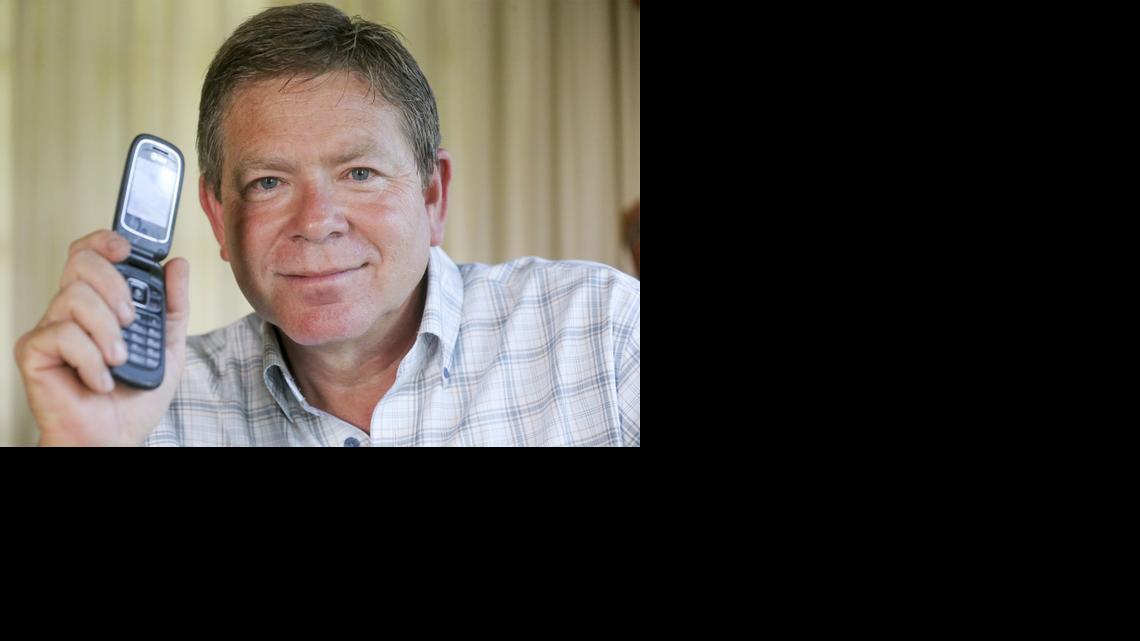 Bryan Mann was put on hold for three minutes when he called 911 after spotting someone driving erratically near Maize recently. (June 11, 2014)

