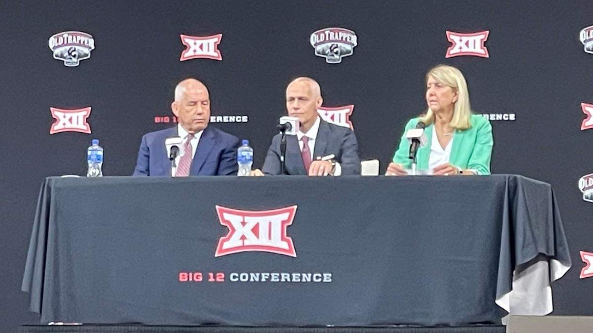 New Big 12 commissioner Brett Yormark (center) talks at media days along side Bob Bowlsby and Baylor president Linda Livingstone at AT&T Stadium.