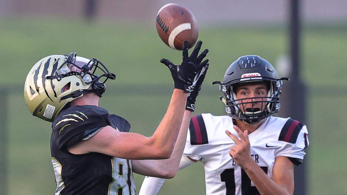 Andover Central receiver Brock Stupka hauls in a deep catch in the Jaguars’ 21-19 win over Buhler on Friday.