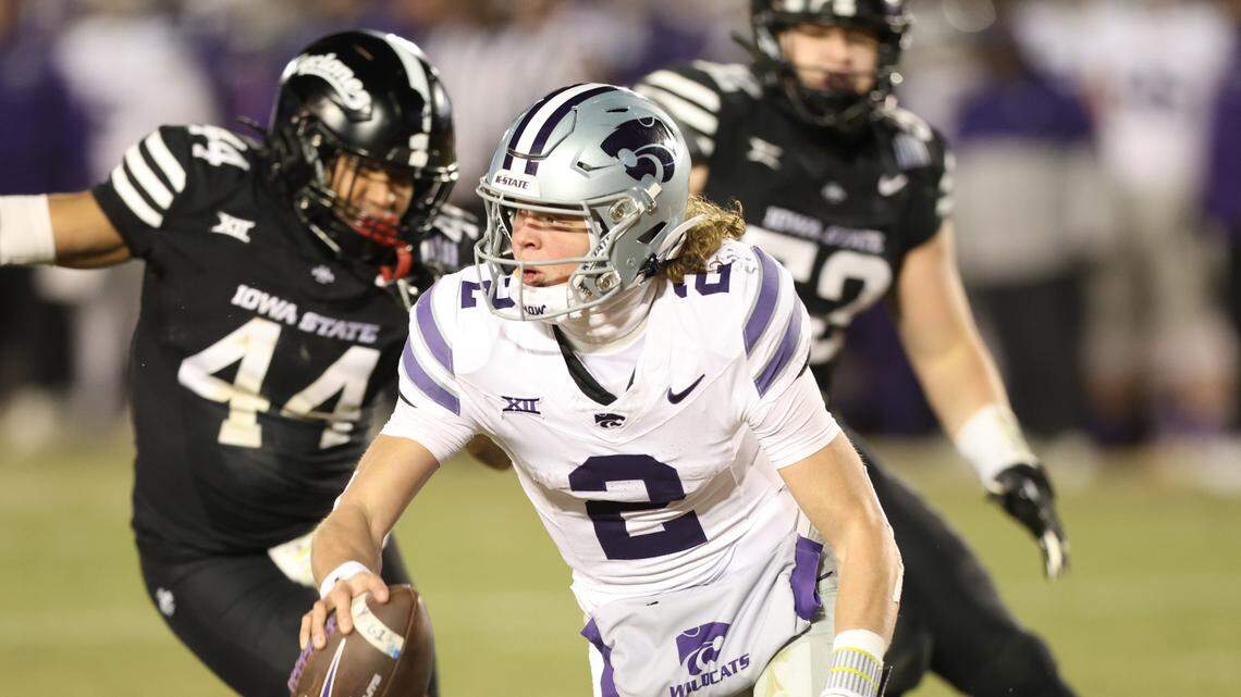 Kansas State Wildcats quarterback Avery Johnson (2) is pressured by Iowa State Cyclones linebacker Jacob Ellis (44) in the fourth quarter of a 2024 meeting at Jack Trice Stadium.
