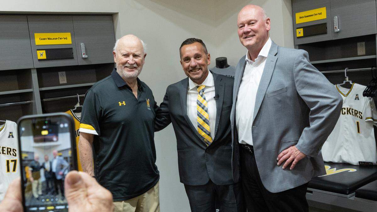 Brian Green, middle, has his photo taken with legendary WIchita State baseball coaches Gene Stephenson, left, and Brent Kemnitz  after Green was introduced as the newest coach of WIchita State baseball during a press event on Wednesday at Eck Stadium. Green comes to WSU from Washington State University. 