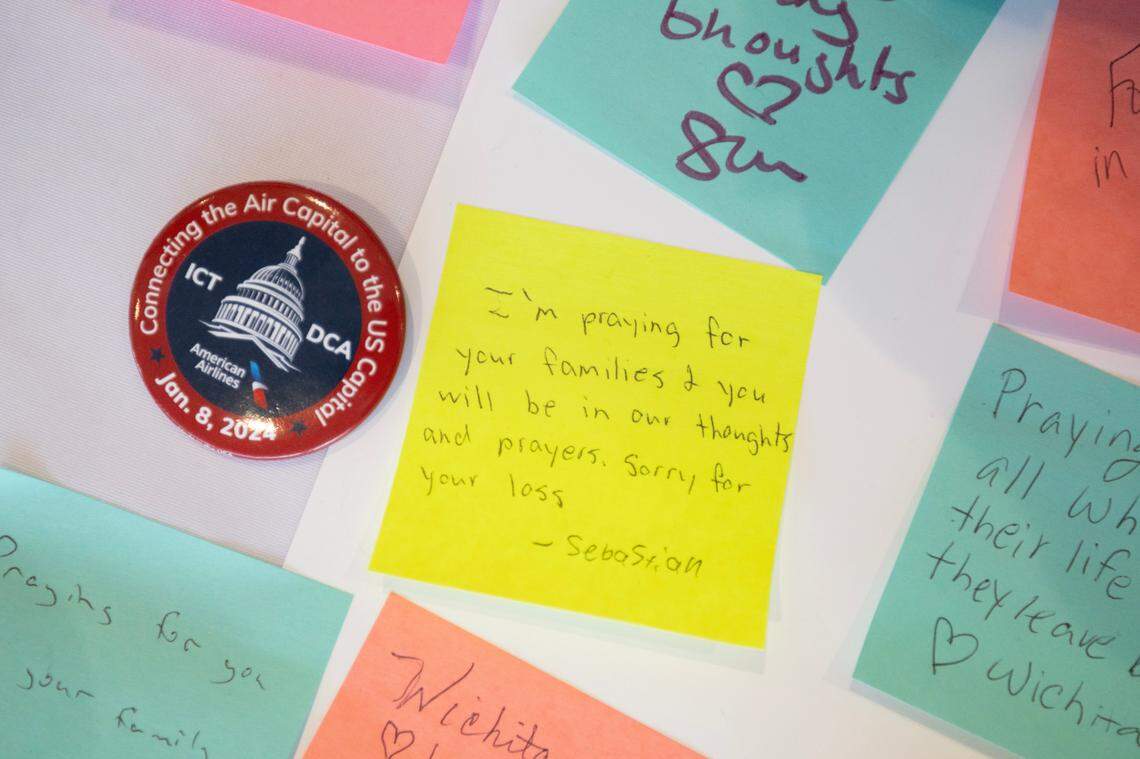 A table at Wichita’s Eisenhower Airport has been set up for people to leave messages of condolence for the crash victims.