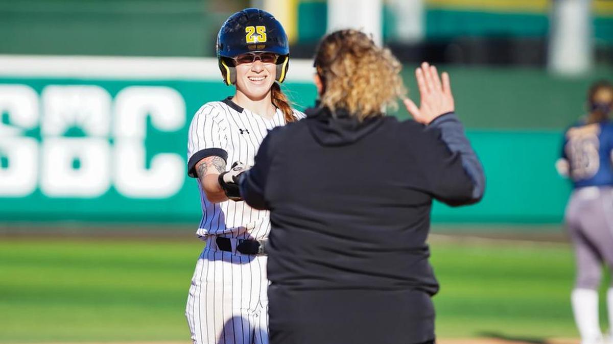Wichita State star softball player Sydney McKinney became the first WSU player to reach 300 career hits and also moved up the NCAA record books with her 29-game hitting streak.