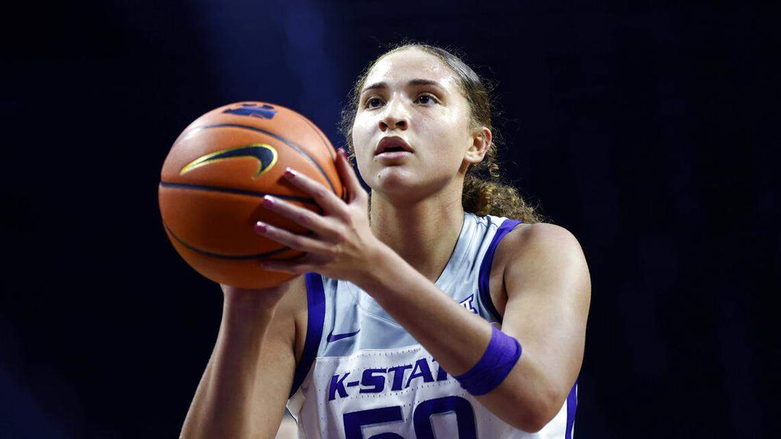 FILE - Kansas State center Ayoka Lee during an NCAA basketball game on Saturday, Dec. 18, 2021, in Manhattan, Kan. Lee broke the NCAA women’s single-game scoring record for Division I with 61 points to help Kansas State romp to a 94-65 victory over No. 14 Oklahoma on Sunday, Jan. 23, 2022. (AP Photo/Colin E. Braley, File)