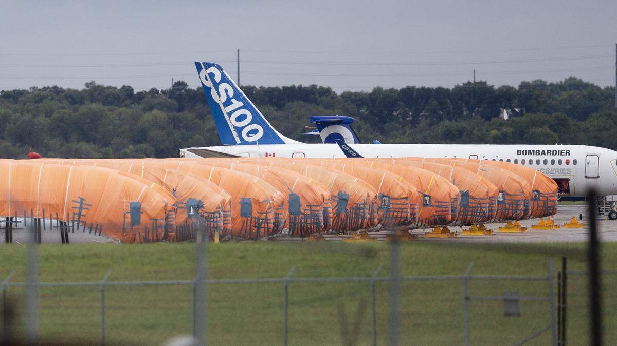 Completed Boeing 737 Max fuselages, made at Spirit AeroSystems, were stored under tarps at Air Capital Flight Line in Wichita in 2019 after two fatal crashes grounded existing planes and delayed production of new ones.