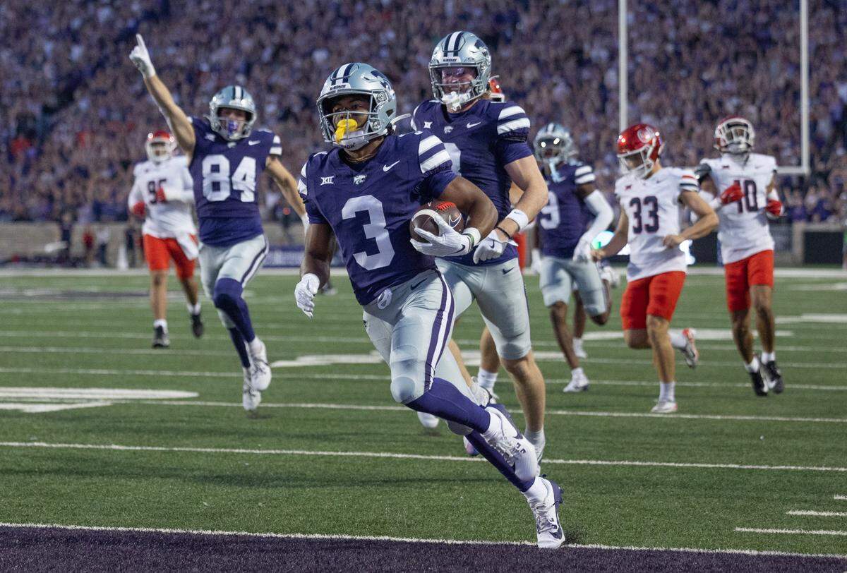 Derby High School alum Dylan Edwards runs a punt back for a touchdown during the second quarter the Kansas State’s game against Arizona on Friday night at Bill Snyder Family Stadium.