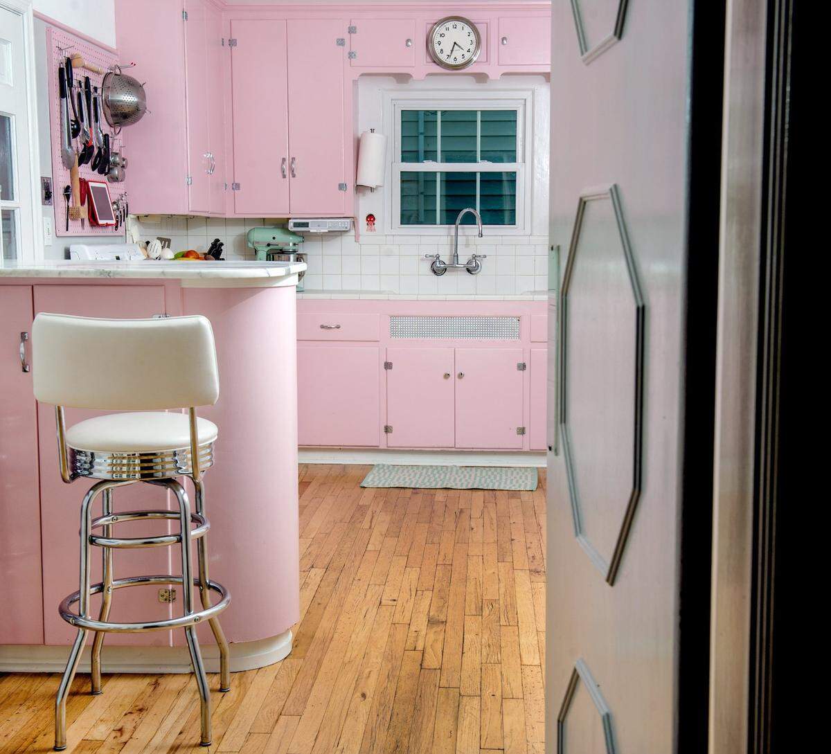 Kitchens in the 1950s were often pastel pink, blue or yellow.