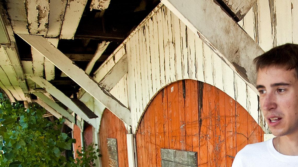 Restore Hope president Alex East talks about the restoration of Joyland amusement park in the doorway to the former Dodgem bumper car ride. The organization is heading up the Joyland Restoration Project, and has recently obtained nonprofit status. (Monday, June 25, 2012.)