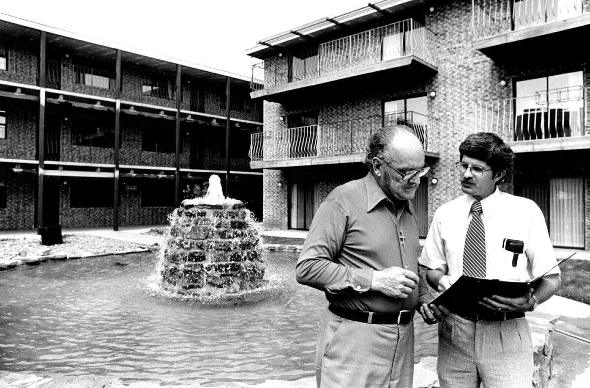 The Rev E.E. Kardatzke, left, a developer of Maple Gardens Retirement Center, is pictured as the center was about to open with architect Dave Hollis. Kardatzke’s son, Jon, was one of the center’s owners.