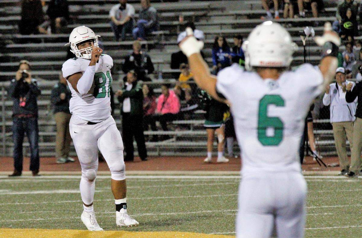 Derby senior defensive lineman Isaac Keener wags his finger at the end of the Panthers’ 24-6 win at Bishop Carroll on Friday. (Sept. 21, 2018)