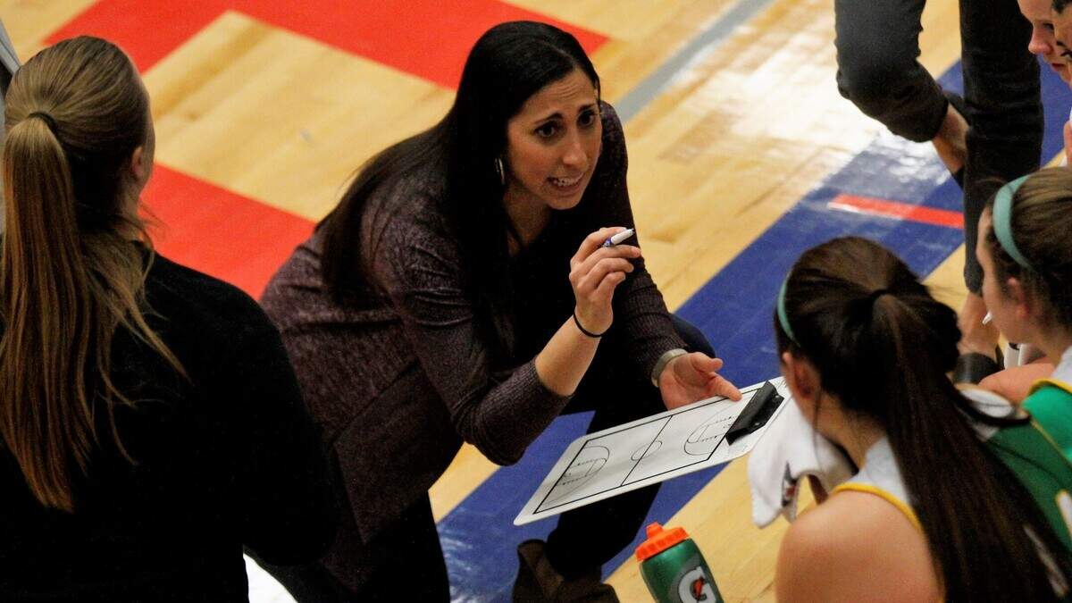 Bishop Carroll coach Taylor Dugan has helped lead the girls basketball team to an undefeated start. Carroll will play in Newton Invitational championship on Saturday.