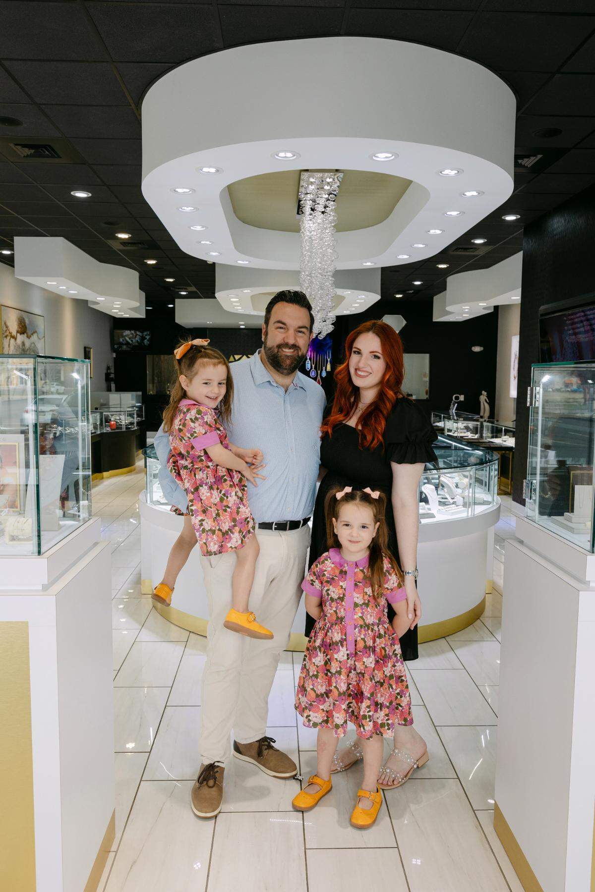 Ben and Sally Winterman are the new owners of Powell Jewelry, and Sally Winterman said they’d like the store to be a family business. They’re shown with their daughters, Minnie, right, and Marigold, left.