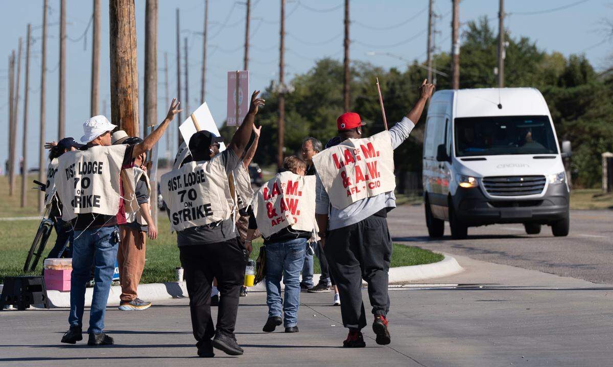 Striking Textron employees picket in front of the facility on Greenwich Rd. Around 5,000 members of the IAM Local 774 are on strike after rejecting the company’s latest contract offer on September 21, 2024, and voted to go on strike.