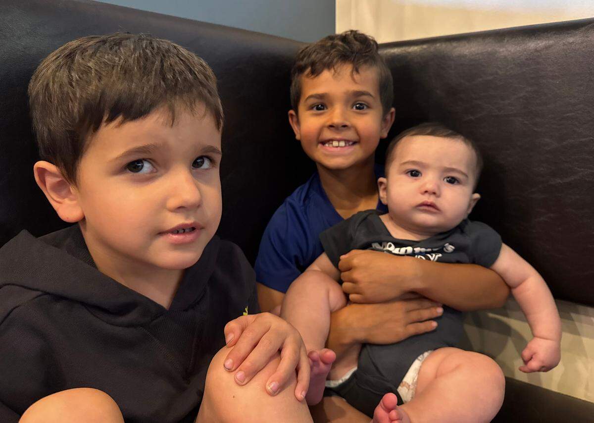 The third generation of N&J Cafe: John Srour’s sons Noah, 4, left, and River, 8, center, plus Nick Srour’s 5-month-old son Pierce