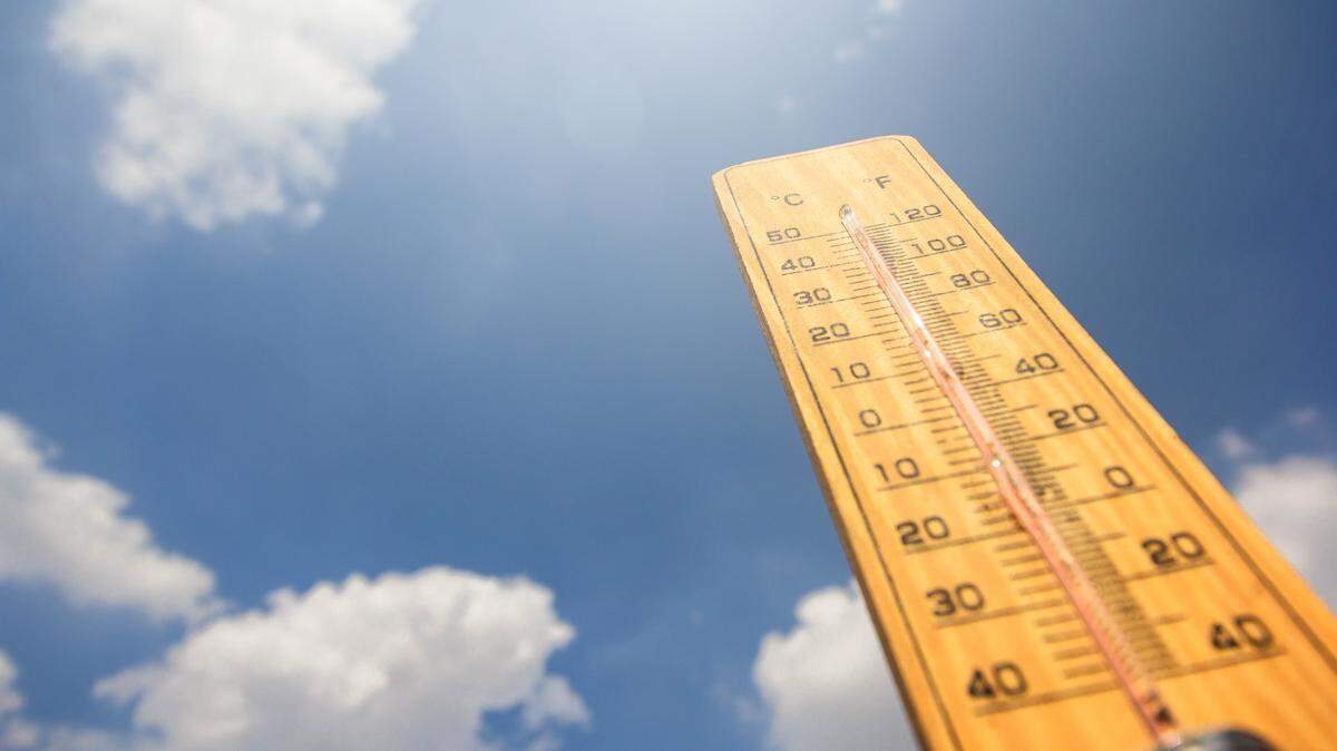 Thermometer background is blue sky Content on global warming