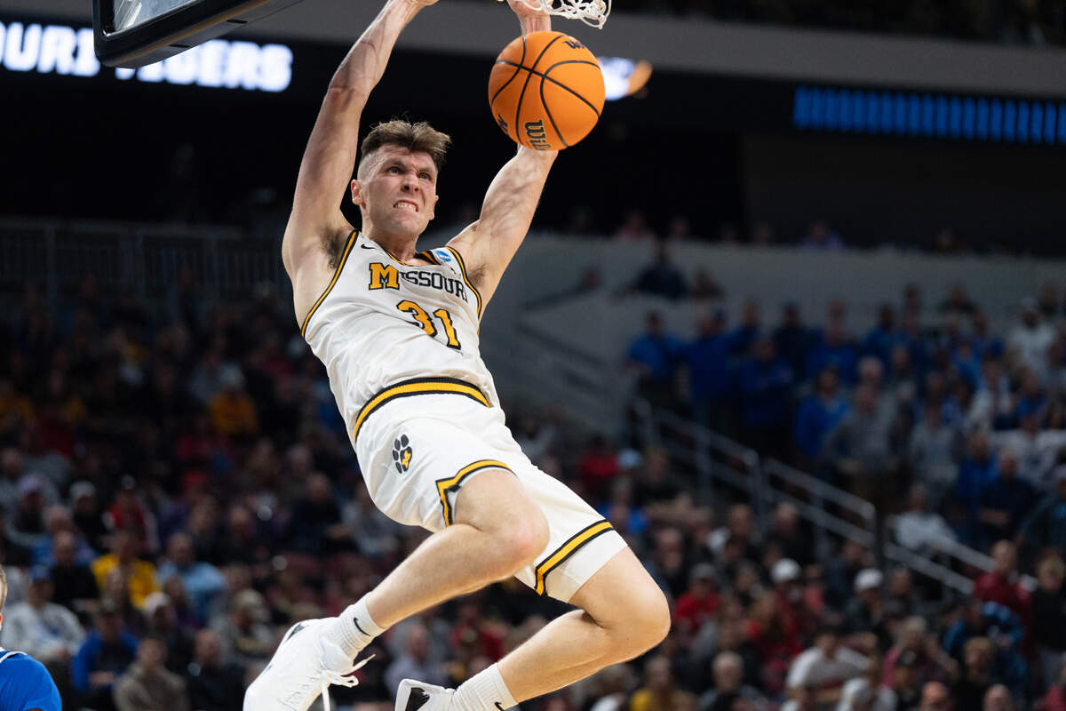 Missouri’s Caleb Grill dunks late in the game against Drake. Missouri lost in the first round of the 2025 NCAA Division I Men’s Basketball Championship in Wichita on Thursday, March 20, 2025.
