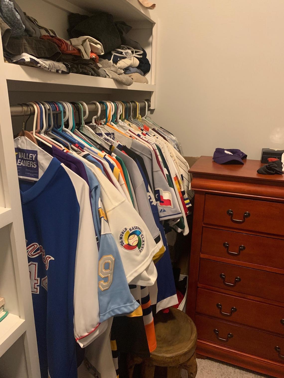 Kansas State baseball coach Pete Hughes owns more than 100 retro jerseys.