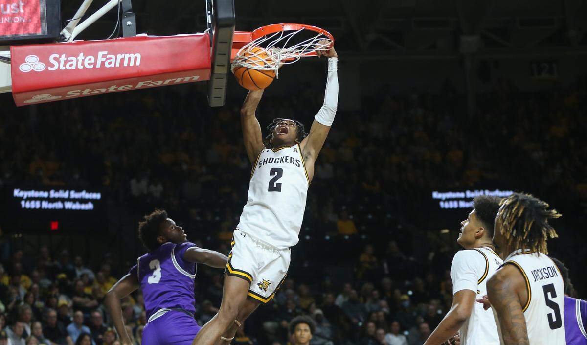 Chaunce Jenkins dunks the ball during the first half against Tarleton State on Tuesday at Koch Arena.