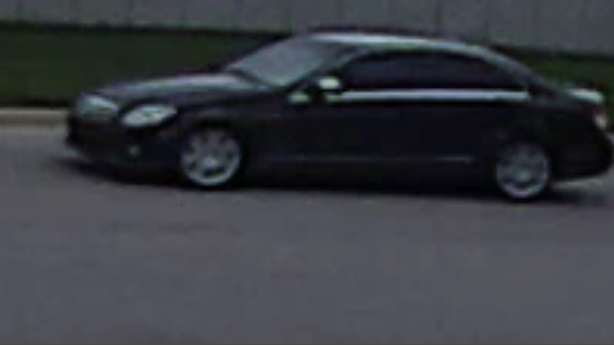 Witnesses say a man fired his handgun and forced a woman into this dark colored car Monday afternoon in northeast Wichita.  Anyone with information is asked to contact police.