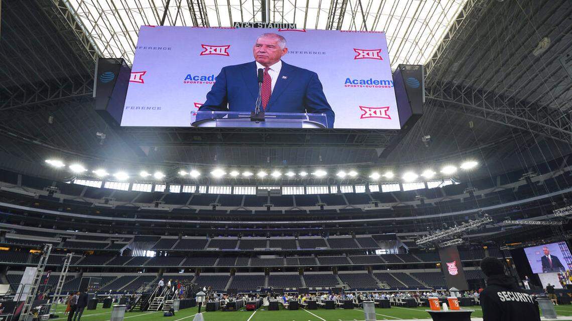 Big 12 commissioner Bob Bowlsby is shown on the giant screen as he speaks during NCAA college football Big 12 media days Wednesday, July 14, 2021, in Arlington, Texas. (AP Photo/LM Otero)