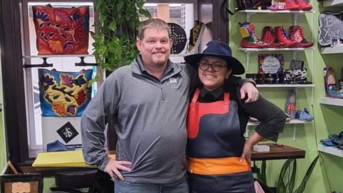 Aida Stenholm, right, is closing her namesake shoe store at Clifton Square, but she and her husband, Brett, plan to keep selling online and hope to reopen another store one day.
