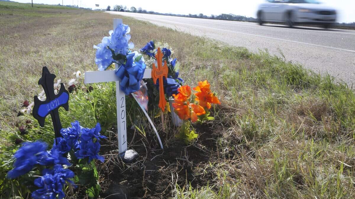 A roadside memorial at 21st and 167th Street West marks where off-duty Wichita police Officer Stacy Woodson died in a traffic collision Friday night. Woodson, 37, had been a Wichita police officer for 16 years. His 9-year-old son, Braeden, was riding with him and was critically injured. The boy died over the weekend in the hospital. (April 30, 2018)