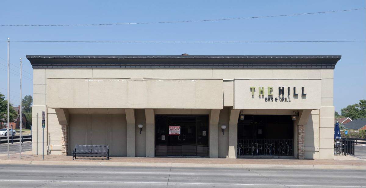 The owners of The Hill Bar & Grill want to take over the space to the west recently vacated by T-Mobile.