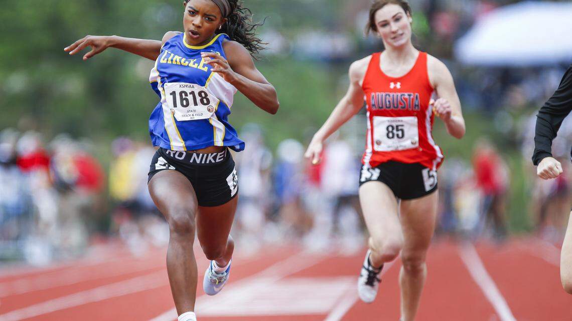 Towards-Circle’s Kimalee Cook, left, wins the 4A 100 meter dash with a time of 12.25 at the Track and Field State Championships at Cessna Stadium Saturday. (May 25, 2019)