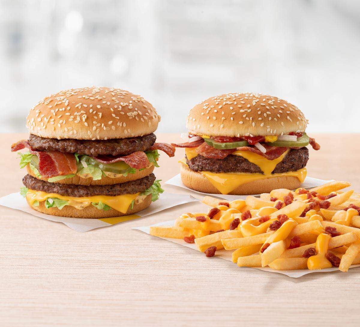 Big Mac Bacon (left) and Quarter Pounder with Cheese Bacon (right) with Cheesey Bacon Fries. Sized for Translite.