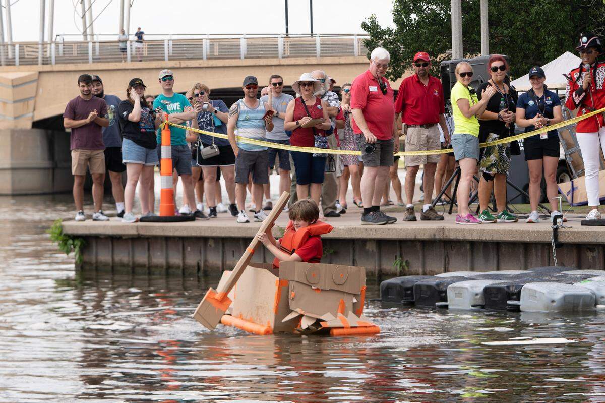 The Cardboard Regatta took place on Sunday afternoon at the Wichita Riverfest. Contestants were given 90 minutes to construct a vessel using only the items they were given: cardboard, duct tape, pool noodles and a box cutter. The contestants were then timed to see how fast they made it to the finish line. Several boats sunk quickly.