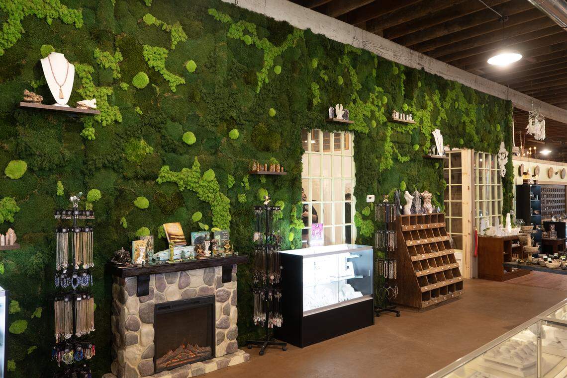Along the left side of the new Connect With Source store is what has to be Wichita’s largest moss wall (not all of it is shown here) with rotating props for photos depending on the season. It can be rented for parties, and there’s an actual event space behind that.