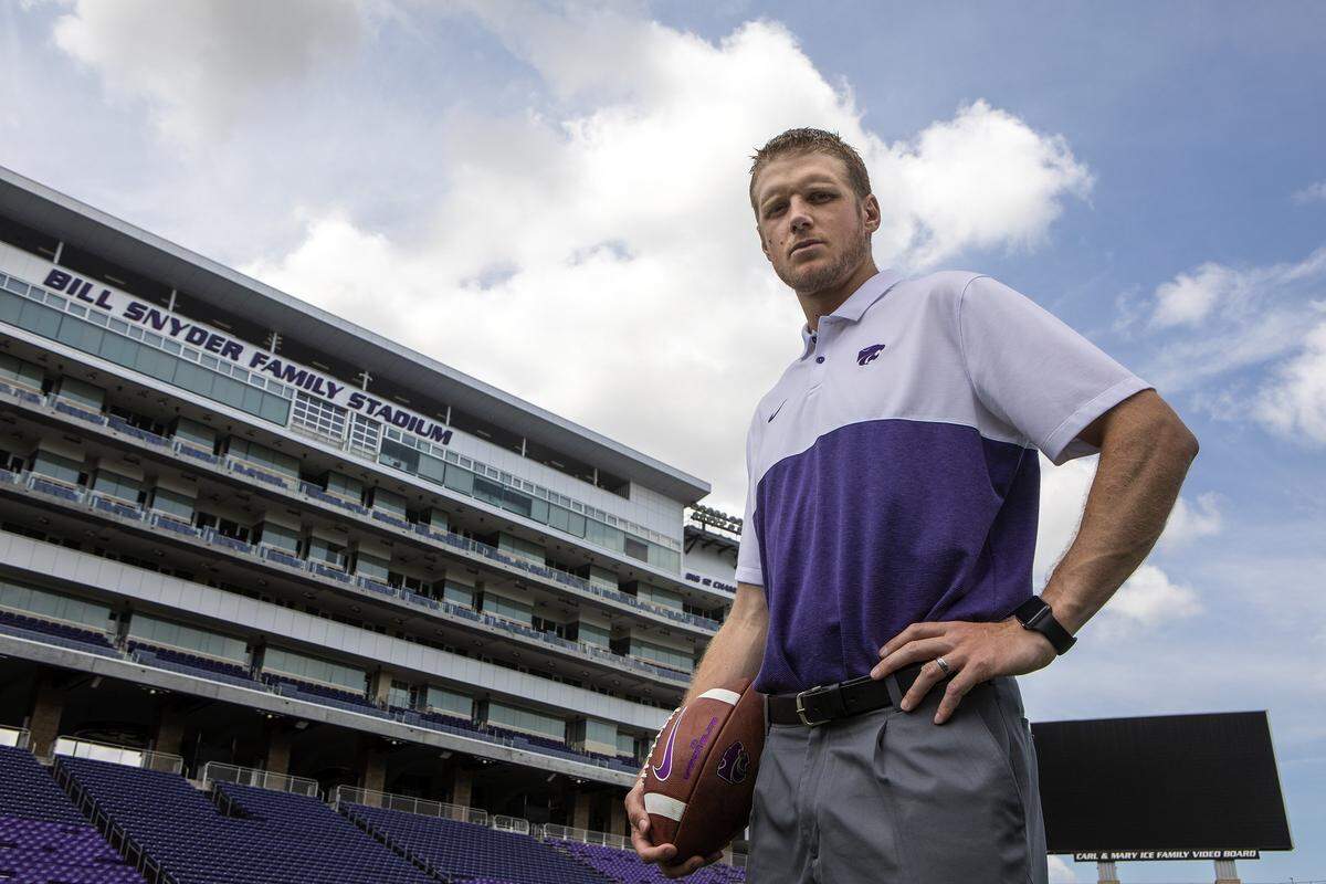 Then-Kansas State quarterbacks coach Collin Klein poses for a portrait at Bill Snyder Family Stadium on Aug. 9, 2019.