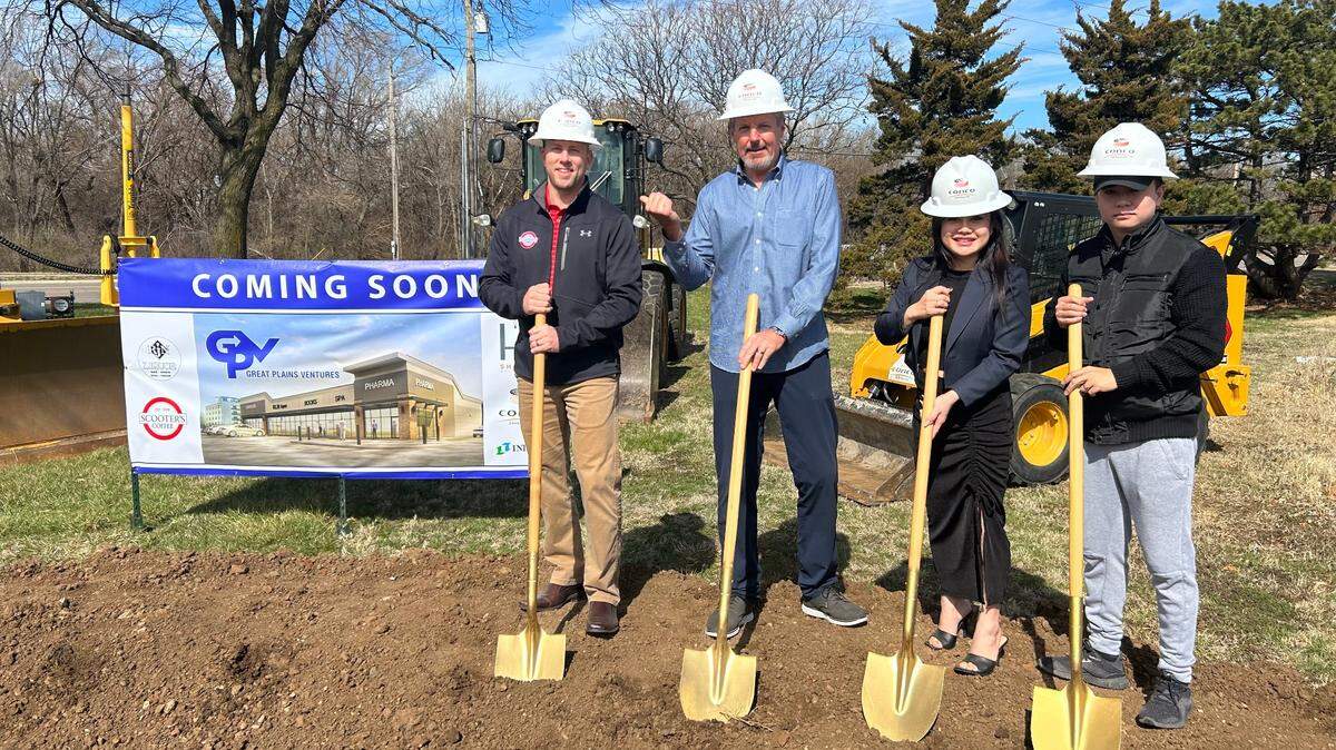 Scooter’s franchisee Ryan Kromer, left, attended a March groundbreaking for new businesses coming to Great Plain Ventures’ District 96 development at K-96 and Oliver. His newest Scooter’s coffee kiosk will be among them.