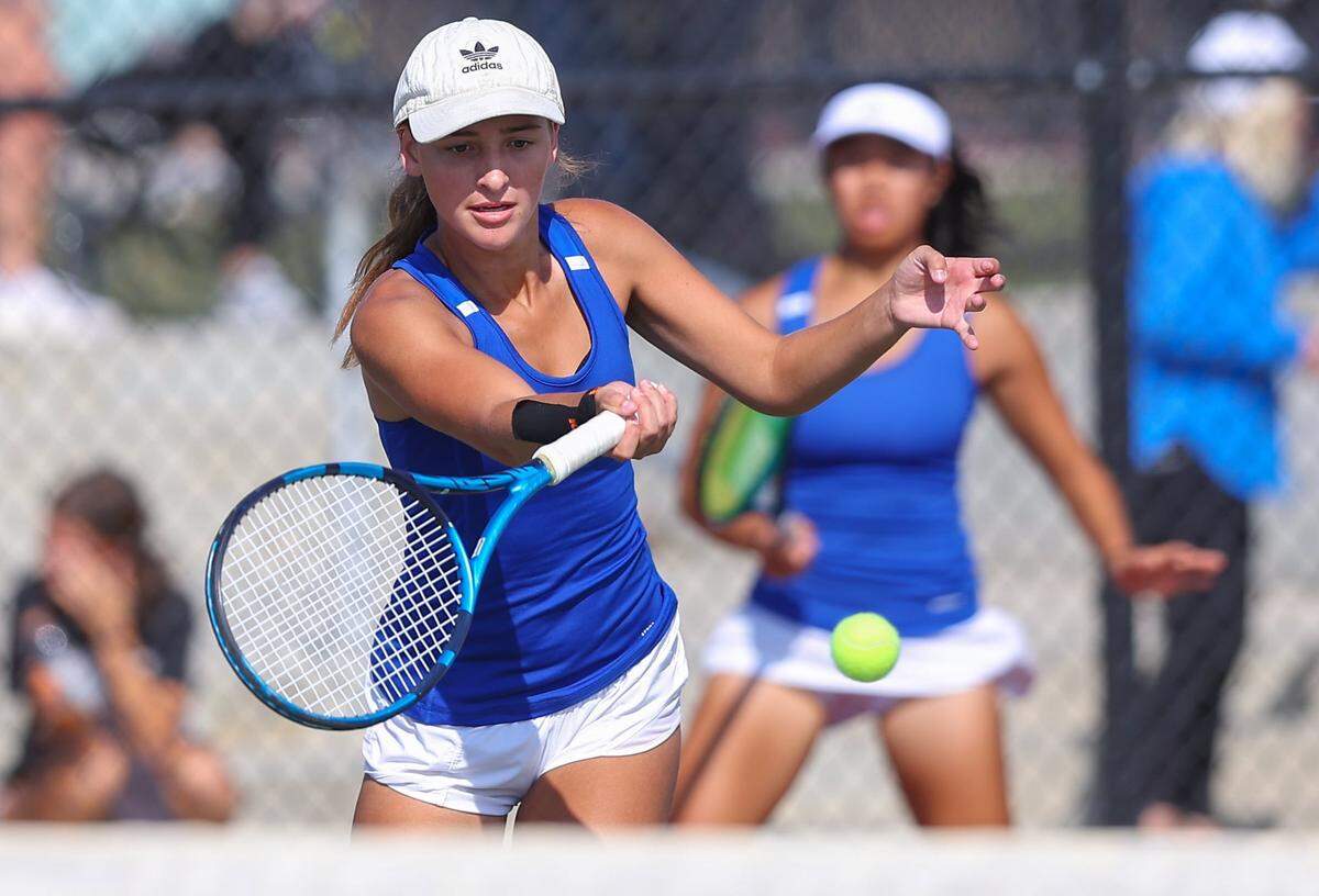 Andover senior Elizabeth Gaddis paired with Nadia Kaewsai to win the Class 5A state doubles championship.