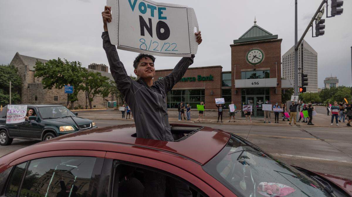 Protesters express their anger over the recent Supreme Court ruling to overturn Roe vs Wade 49 years after it made abortion legal across the United States. Kansas voters will decide the fate of legal abortion in the state on August 2nd.