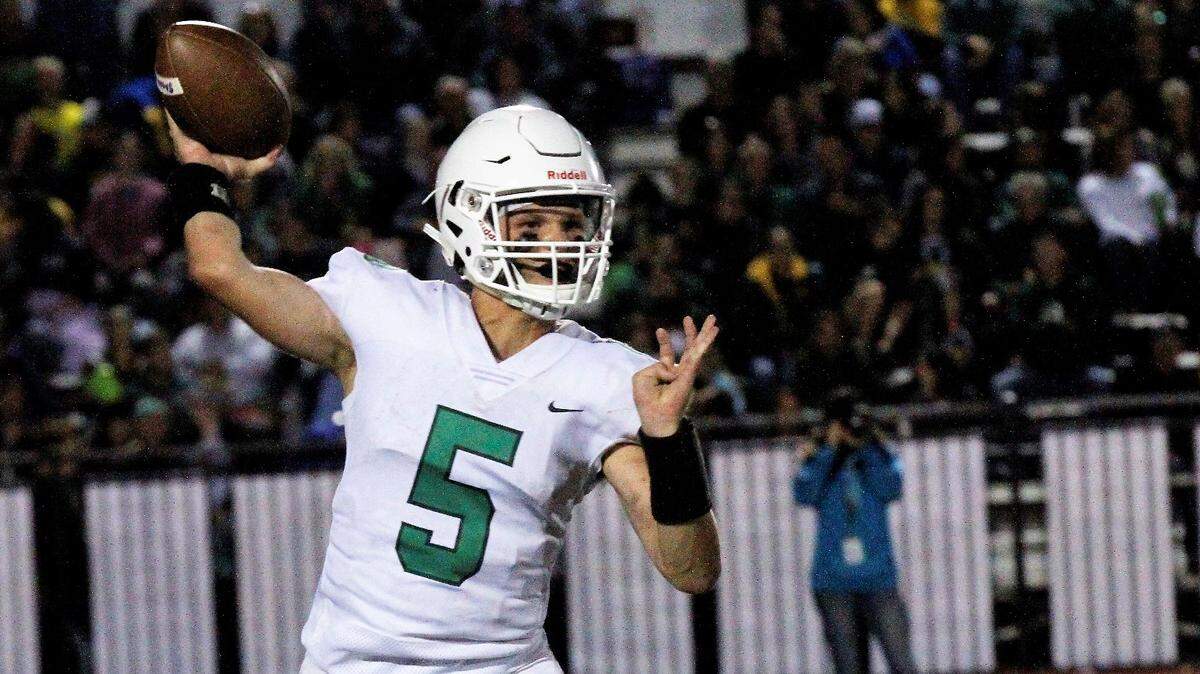 Derby senior Hunter Igo was forced into quarterback duties after starter Grant Adler was injured in the Panthers’ 24-6 win at Bishop Carroll on Friday. (Sept. 21, 2018)
