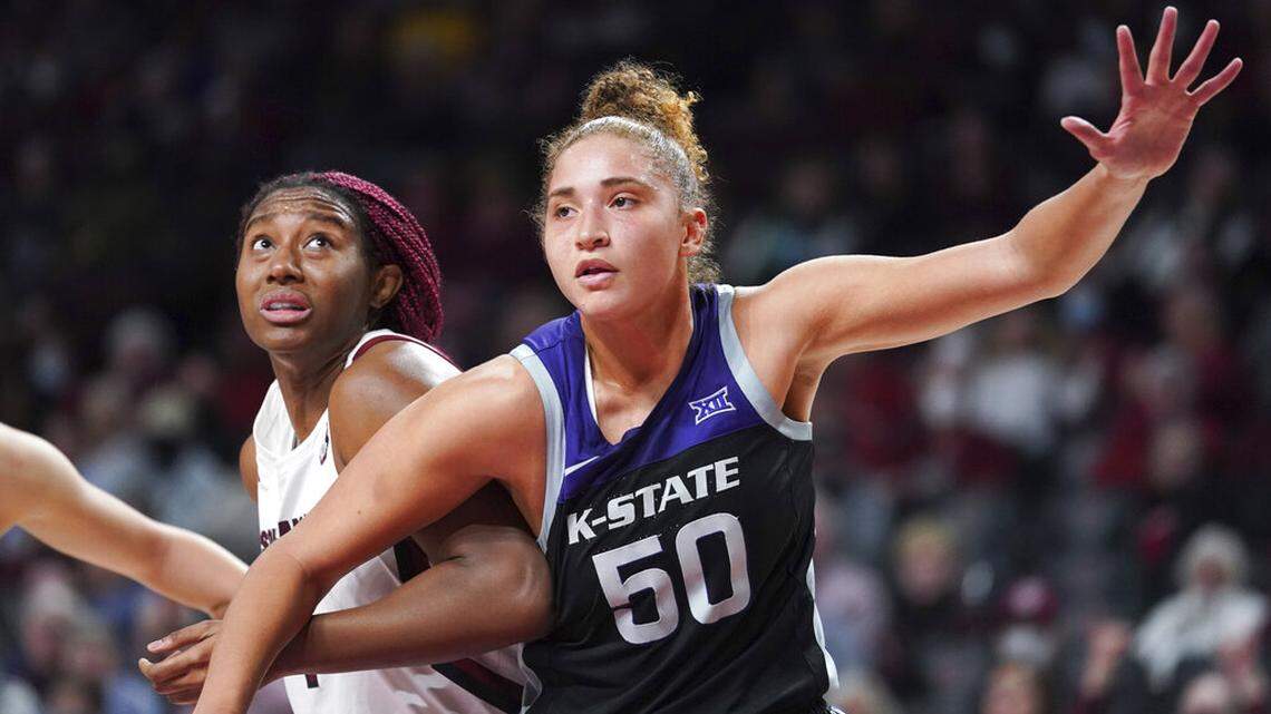 Kansas State center Ayoka Lee (50) boxes out South Carolina forward Aliyah Boston during the first half of an NCAA college basketball game Friday, Dec. 3, 2021, in Columbia, S.C. South Carolina won 65-44. (AP Photo/Sean Rayford)